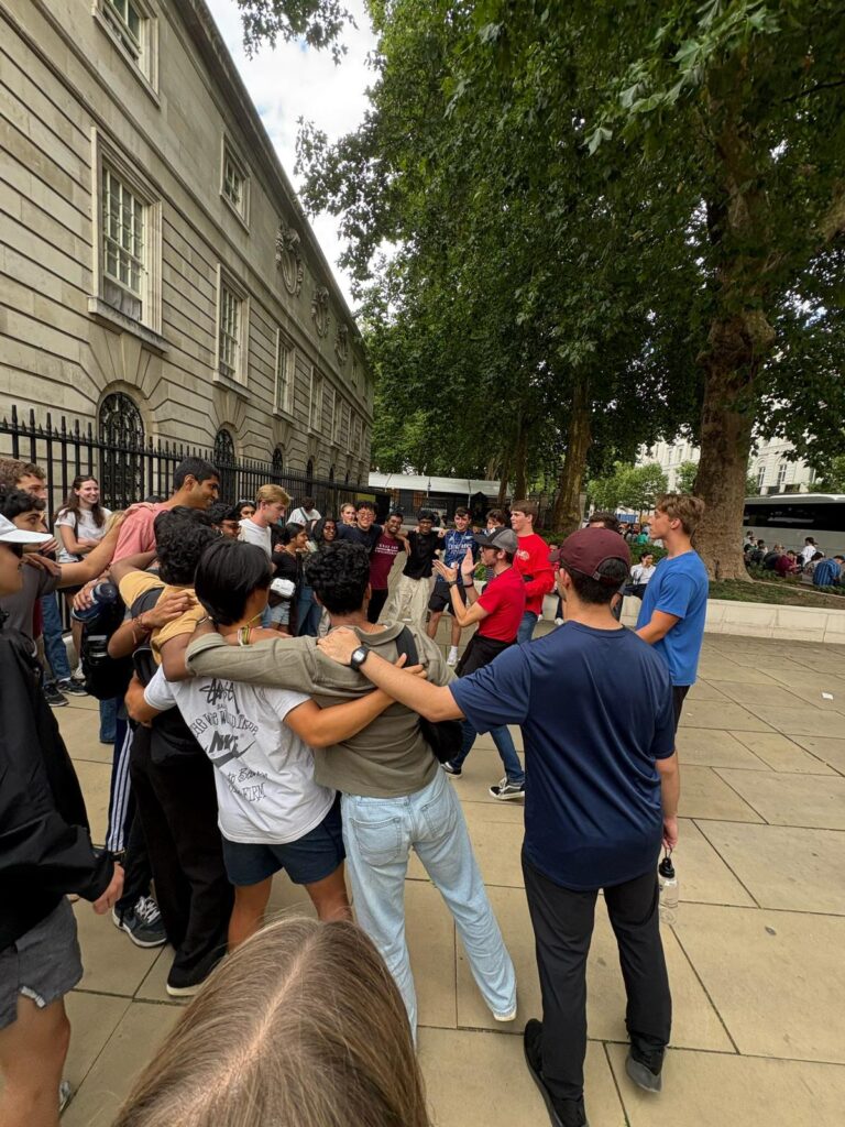 A group of students sawing them off in London.